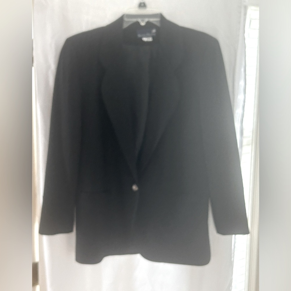 STANLEY BLACKER 100% silk blazer fits true to size , a bit roomy,